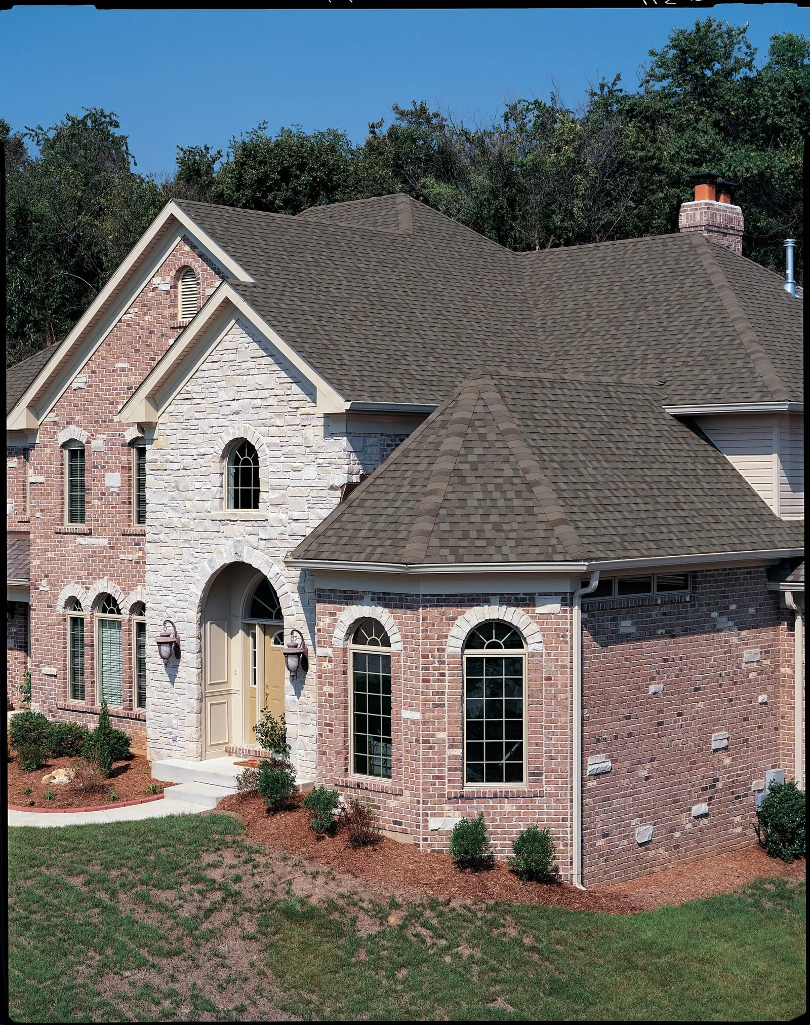Home with TAMKO Titan XT shingles in Natural Timber