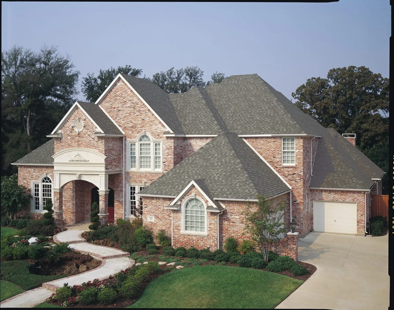 Home with TAMKO Titan XT shingles in Oxford Grey