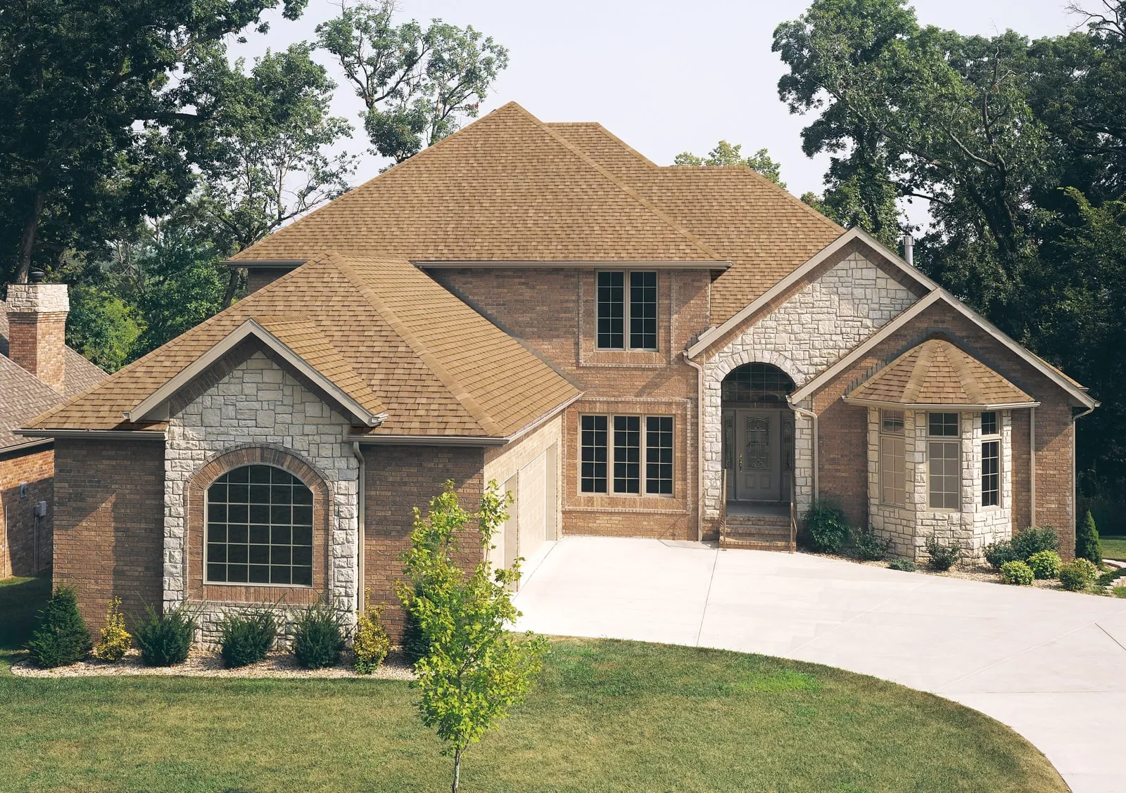 Home with TAMKO Titan XT shingles in Rustic Cedar